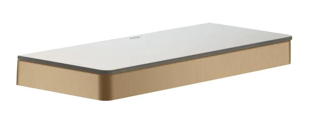 Eine flache Ablage mit einer weißen Oberfläche und einem bronzefarbenen Unterteil. Das Produkt gehört zur AXOR Kollektion und hat eine minimalistische Form.